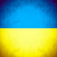 Ukraine national flag colors on rustic background.