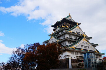 Autumn in Japan leaves turn yellow or red, very beautiful. Osaka Castle is a Japanese castle in...