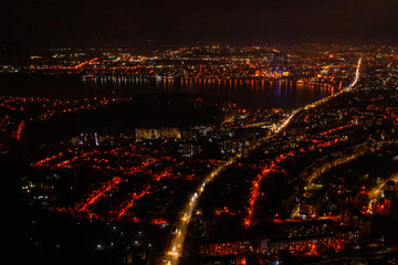 Fototapeta na wymiar Night city, night city view from drone, nightlife landscapes in big cities.