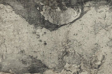 A cement grunge texture with cracks and damages. Old concrete wall, abstract background.