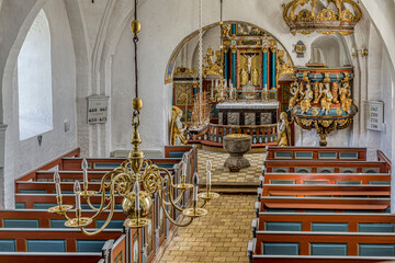 interior of a biright and colourful danish church