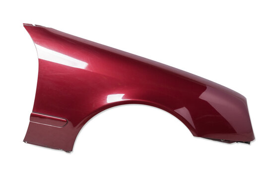 Red metallic fender on a white isolated background in a photo studio for sale or replacement in a car service. Mudguard on auto-parsing for repair or a device to protect the body from dirt