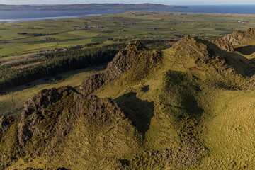 Hiking and Wild Camping, Binevenagh Mountain, Causeway coast and glens, area of oustanding natural beauty, County Londonderry, Northern Ireland