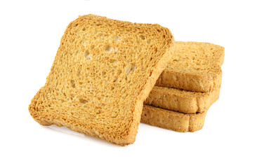 Stack of golden color bread toasts isolated on white background