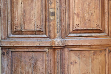old wooden brown door with handle, background 