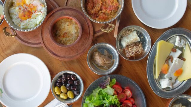 Traditional rich Turkish village breakfast on the wooden table