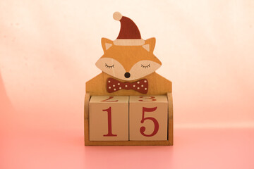 Numbers or dates on wooden cubes with fox, fifteen