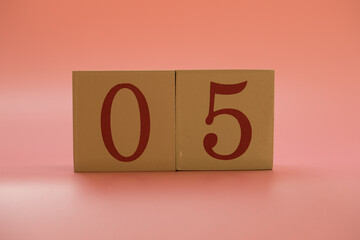 Numbers or dates on wooden cubes, five