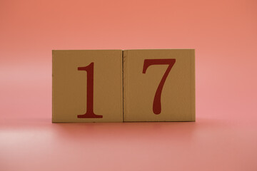 Numbers or dates on wooden cubes, seventeen