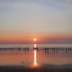 sunset on the beach, sun, colorful sky
