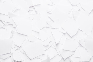 Empty white paper pieces as a background.