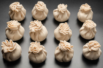 Traditional raw khinkali, georgian cuisune.
