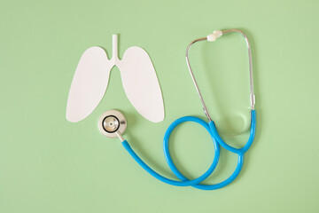 paper cut human lungs and stethoscope top view