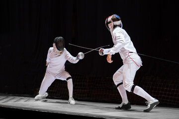 Fight at a fencing competition - obrazy, fototapety, plakaty