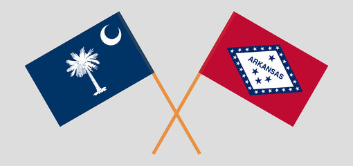 Crossed flags of The State of South Carolina and The State of Arkansas. Official colors. Correct proportion
