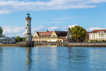 Lindau, Germany. Lighthouse and lion statue (19th century) at the entrance to the port