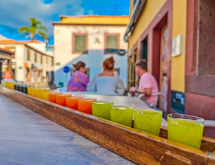 Shoot of a colorful set of Poncha - traditional alcoholic drink from the island of Madeira.