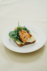 sandwich with shrimp, cucumber, egg and herbs