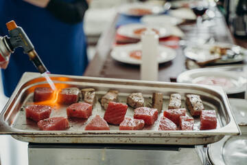 the dance is burned with an open flame burner