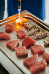 the dance is burned with an open flame burner