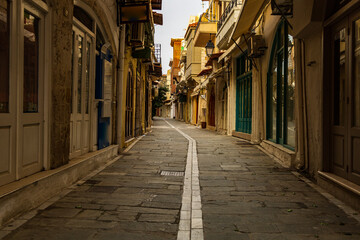 Scenic morning shot of a narrow alley in the old town of the greek village of Rethymno Crete, Greece