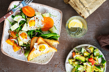 fried eggs with vegetables, top view, diet salad with quail eggs