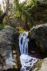 Beautiful shot of a river with waterfall at Richtis Gorge in Crete, Greece