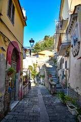 A narrow street among the old stone houses of Sarno, town in Naples province, Italy.