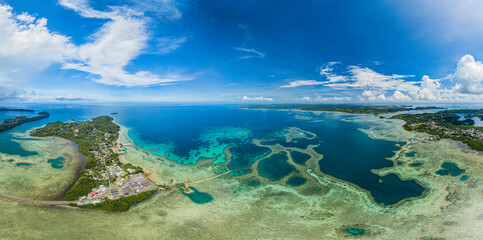 Fototapeta na wymiar High wide angle aerial panorama of islands and coral reefs of Palau, Micronesia, Pacific Island.