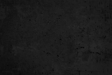 Black concrete wall. Grunge background