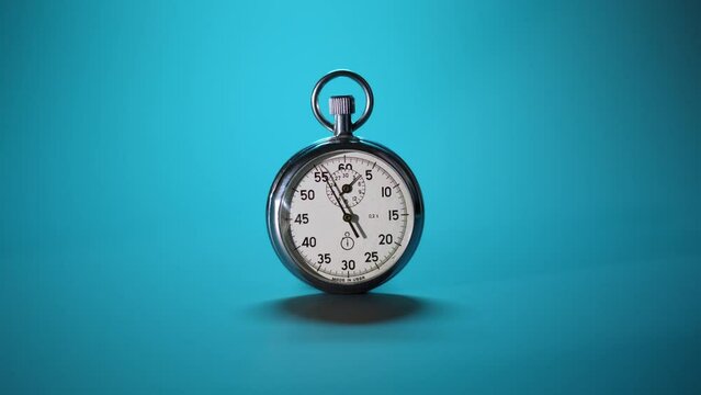 Close up chromed retro stopwatch counts down time to deadline of business processes. vintage stopwatch on blue background goes forward, time is run. End of countdown or start new minute.