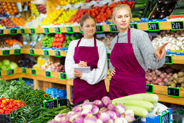 Young girl internship at first job at grocery supermarket