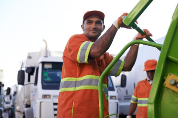 Keeping the city clean. Cropped shot of a team of garbage collectors.
