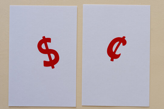 money sign and cent sign on paper