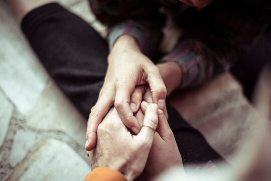 Three person soft and tender handhold