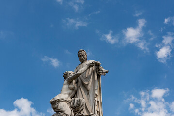 Fototapeta na wymiar The statue of the italian politician Camillo Cavour in the Carlo Emanuele II Square