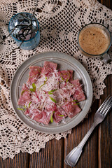 Ravioli, maultaschen, dumplings made from dough with beetroot juice and cheese.