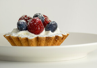 Small fruit tard with white background