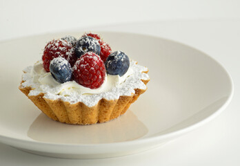 Small fruit tard with white background