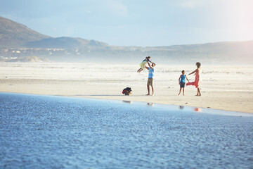 Our time off with the kids is relaxing and rewarding. Shot of a family of four enjoying a day at...