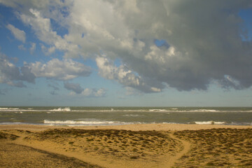 Beach in winter with rough sea and sky with clouds in Abruzzo Italy. Adriatic sea