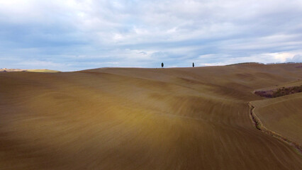 Colorful Tuscany - the typical view over the rural fields of the Acconia desert in Italy