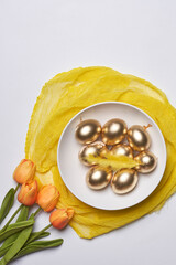 Happy easter time. Bright Easter holiday concept with spring flowers and easter eggs. Colorful Easter eggs background