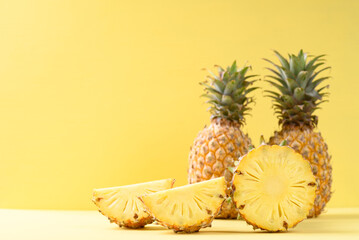 Fresh pineapple fruit on yellow background, Tropical fruit