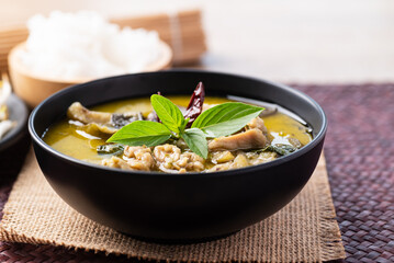 Thai food, Green curry chicken in a black bowl