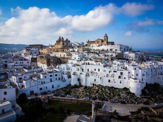 Fototapeta premium The famous white houses of Ostuni in Italy - aerial view - travel photography