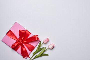 Happy easter time. Bright Easter holiday concept with spring flowers and easter eggs. Colorful Easter eggs background