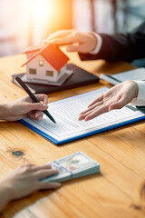 Real estate agent company offer customer to signing contract for buying house in estate agent...