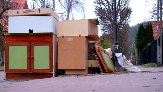 Pile of Old Furniture and Household Goods Dumped on the Street Prepared for Bulk Item Curbside Pickup Collection by City Services