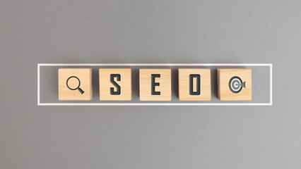 SEO Search Engine Optimization, Wooden block represents growing business goals of SEO.